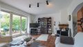 Wohnzimmer mit Kamin