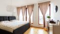 Schlafzimmer mit Dachterrasse