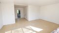 Blick vom Balkon zurück ins Wohnzimmer
