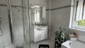 Badezimmer mit Dusche und...