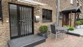 Hauseingang mit zweiter Terrasse