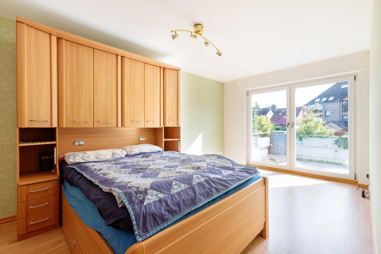 Schlafzimmer mit Balkonzugang