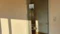 Glasschiebetürelement zum Wohnzimmer